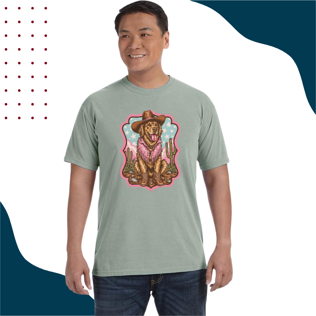 Man wearing a light green t-shirt with a cowboy golden retriever on it