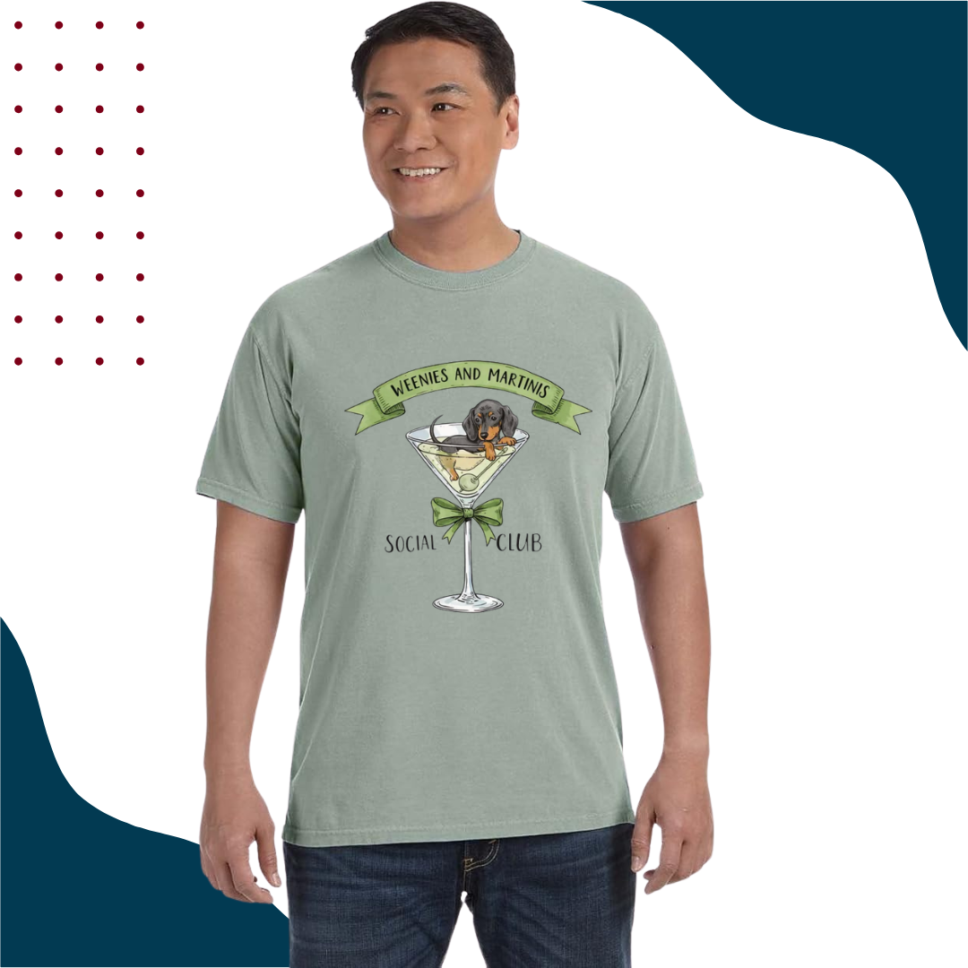 Man wearing a light green t-shirt with a wiener dog in a martini glass
