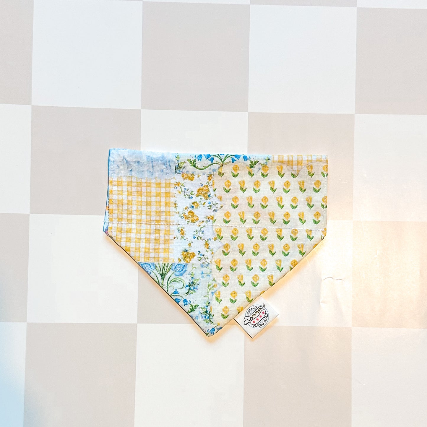 Floral patterned bandana on a checkered background