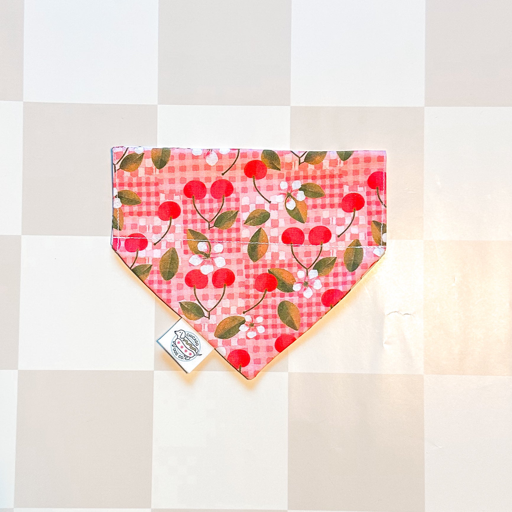 Pink checkered bandana with cherry pattern